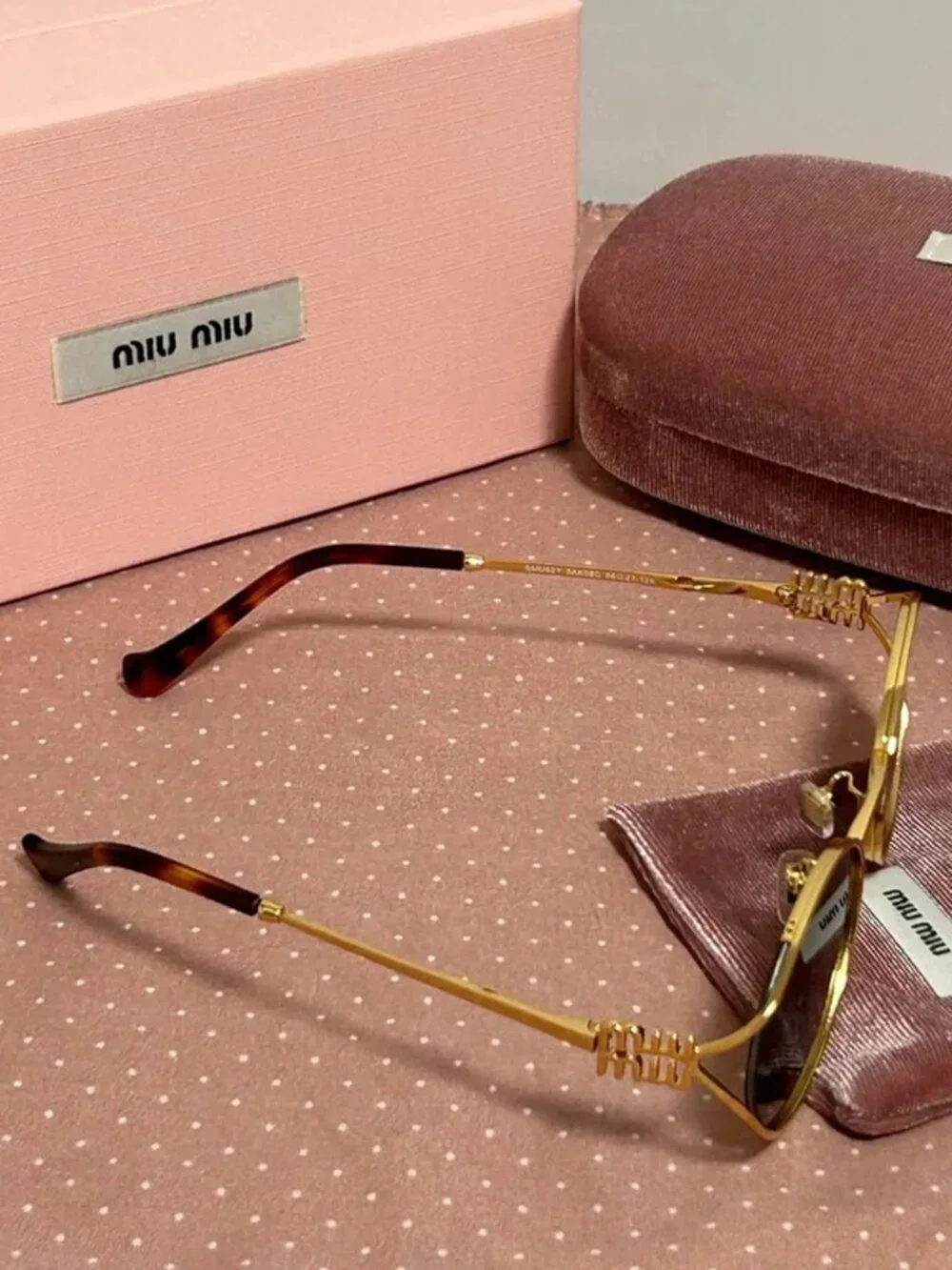 Miu Miu Gold Round Metal Sunglasses with Dark Lenses